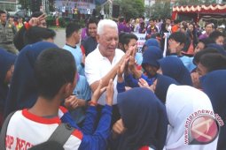 Aksi Damai Stop Kekerasan Perempuan dan Anak