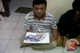 Polisi Tanjabar sita uang palsu