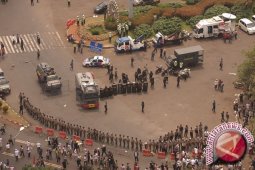 Sore ini, polisi tentukan status empat pendemo di MK