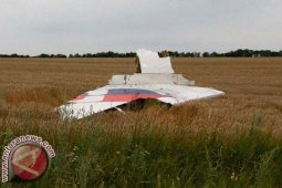 Jenazah Korban MH17 Tiba di Malaysia