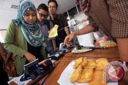Penggunaan Uang Elektronik