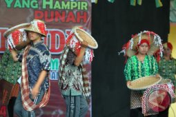 TRADISI BAANDI-ANDI