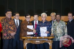 KIH-KMP Sepakat "Damai"