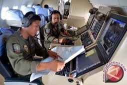 Cuaca Buruk Halangi Pencarian AirAsia