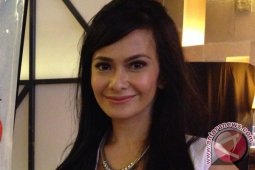 Presenter Ersa Mayori Biasakan Anak Merawat Gigi