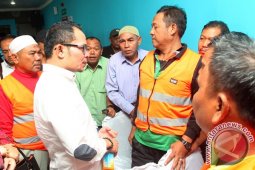 BANGUN PERUMAHAN PEKERJA