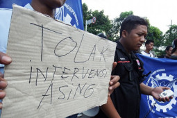 Tolak Intervensi Asing
