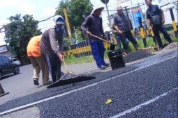 Pengaspalan Lintasan Rel
