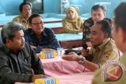 BERDIALOG DENGAN KOMISI X
