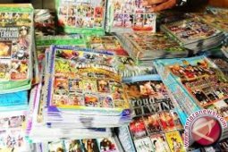 Antara pemberantasan pembajakan  dan peran ekonomi kreatif