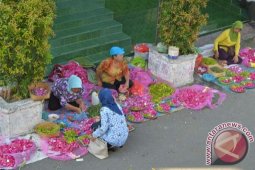 Penjual Musiman Bunga Tabur