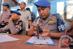 Polres Tulungagung Tarik Sembilan Senpi Anggota