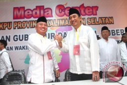 "Murah Senyum"  Pendulang Suara Muhidin-Farid