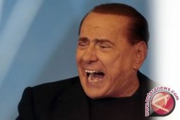 Berlusconi  Setuju Menjual Saham Milan Pada Akrir September