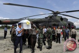 Evakuasi Lanjutan Korban Kecelakaan Trigana Air