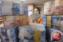 Rupiah Melemah Menjadi Rp14.273 Per Dolar AS