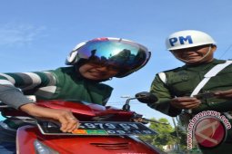 Lepas Stiker TNI