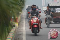 Warga Kota Kisaran Kembali Gunakan Masker