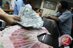 Rupiah Senin pagi melemah menjadi Rp14.447