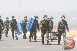 PADAMKAN LAHAN TERBAKAR