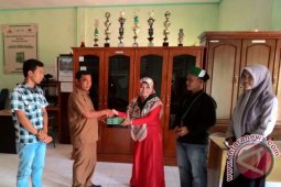 Kohati Bagikan Buku ke Panti Asuhan