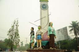 Patung Bermasker