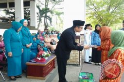 PENYERAHAN SANTUNAN JANDA