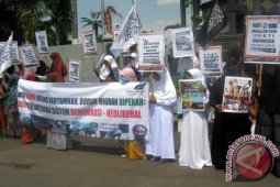 MHTI Jember Demo Tuntut Penghentian Pengiriman TKW