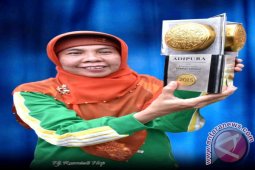 Rusmiaty Harahap, Wanita Ulet Pekerja Keras.