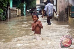 MEDAN DILANDA BANJIR