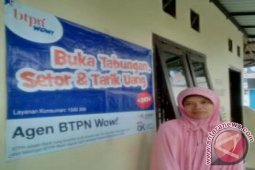 Mimin, Ibu Rumah Tangga Jadi Bankir