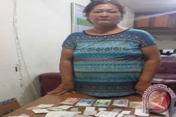 Wanita Paruh Baya Bandar Judi di Sanggau