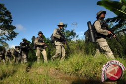 Aparat Tangkap Hidup Satu Anggota Santoso