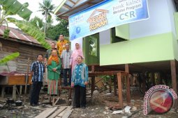 Bank Kalsel Bedah Dua Rumah