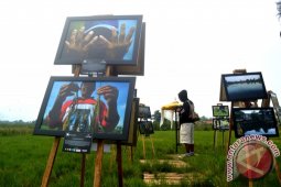 Photo's Speak Berpameran "Tanah Kami Terpapar Limbah"