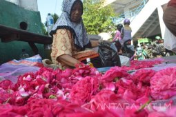 Penjual Musiman Bunga Tabur