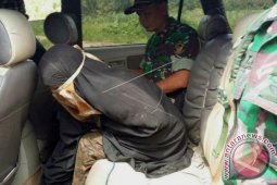 Istri Santoso Serahkan Diri