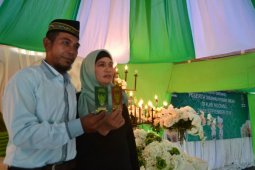 Buku Nikah Untuk Pasangan TKI Haris-Siti