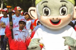 Dua Atlet Difabel Bawa Kirab Api Peparnas XV