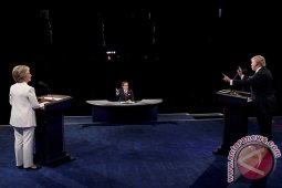 Debat terakhir juga dimenangkan Hillary, Trump dikatai "boneka Putin"