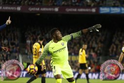 Lawan sembilan pemain Malaga, Barcelona gagal menang