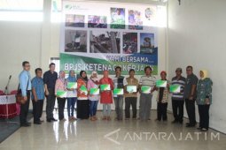 Penyerahan Bukti Kepesertaan Pekerja BPU