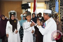 KHATAMAN AL QUR\"AN