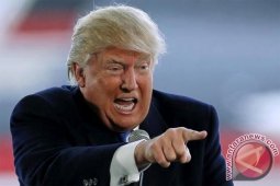 Ribuan orang demonstrasi anti-pelantikan Donald Trump