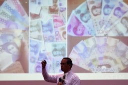 Rupiah Menguat Tipis, IHSG Melemah