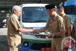 Wabup Asahan Serahakan Mobil Pada Dinas PPKB-PPPA