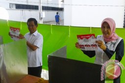 Bupati Batola Mencoblos Di TPS 1