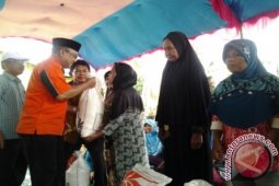 SERAHKAN BERAS KELUARGA SEJAHTERA