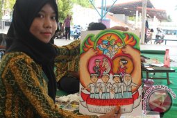 Tapin Sosialisasikan Bahaya Pernikahan Dini Lewat Menggambar