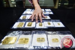 Emas Berjangka Turun Akibat Aksi Ambil Untung